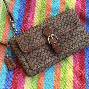 Coach brown monogram wristlet handbag